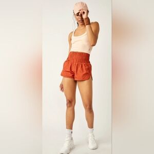 FP Movement "The Way Home" high-rise athletic shorts by Free People. Large Red